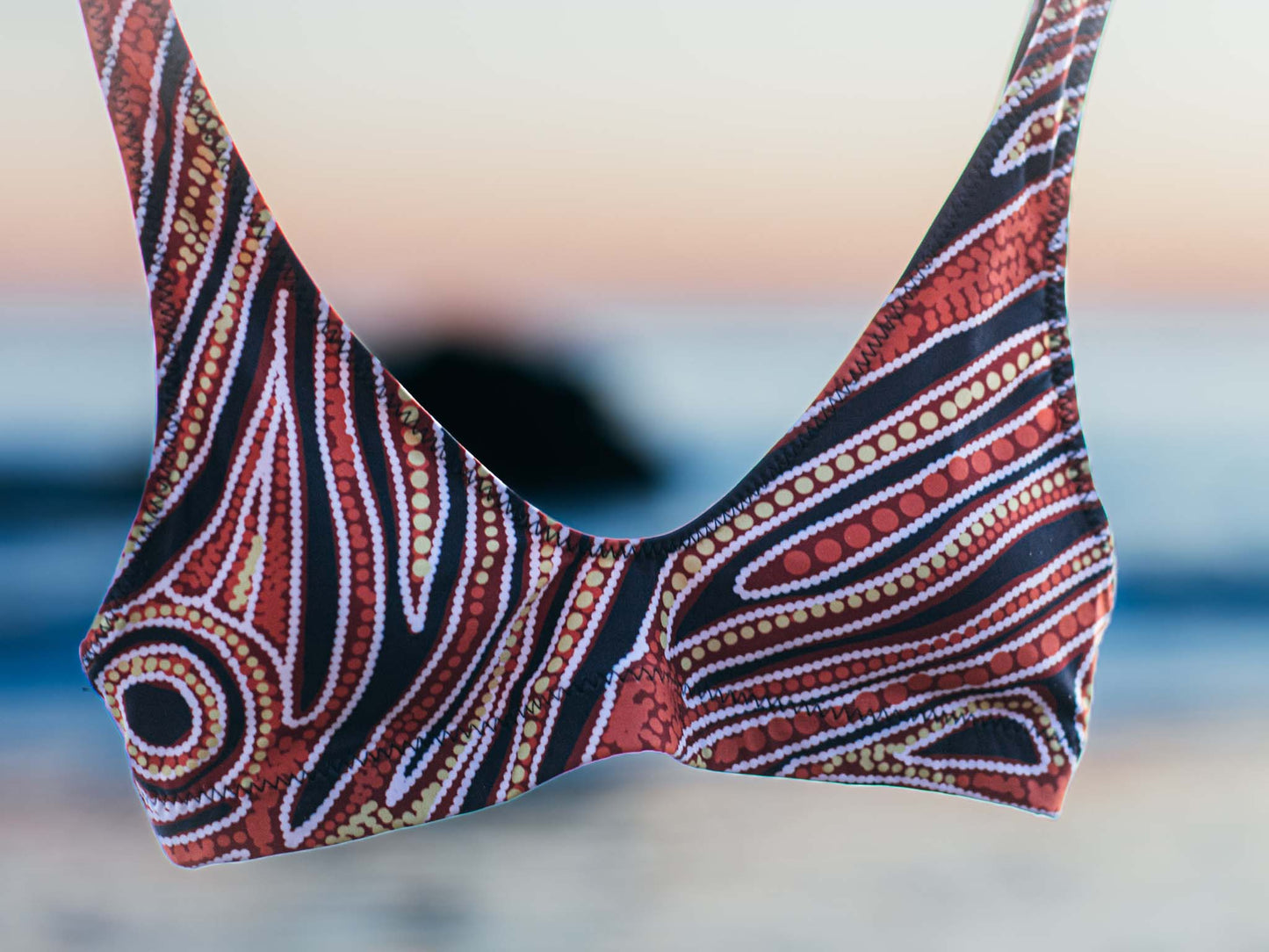 Red earth by Francine Kulitja Padded Sustainable Top - PaletTheory