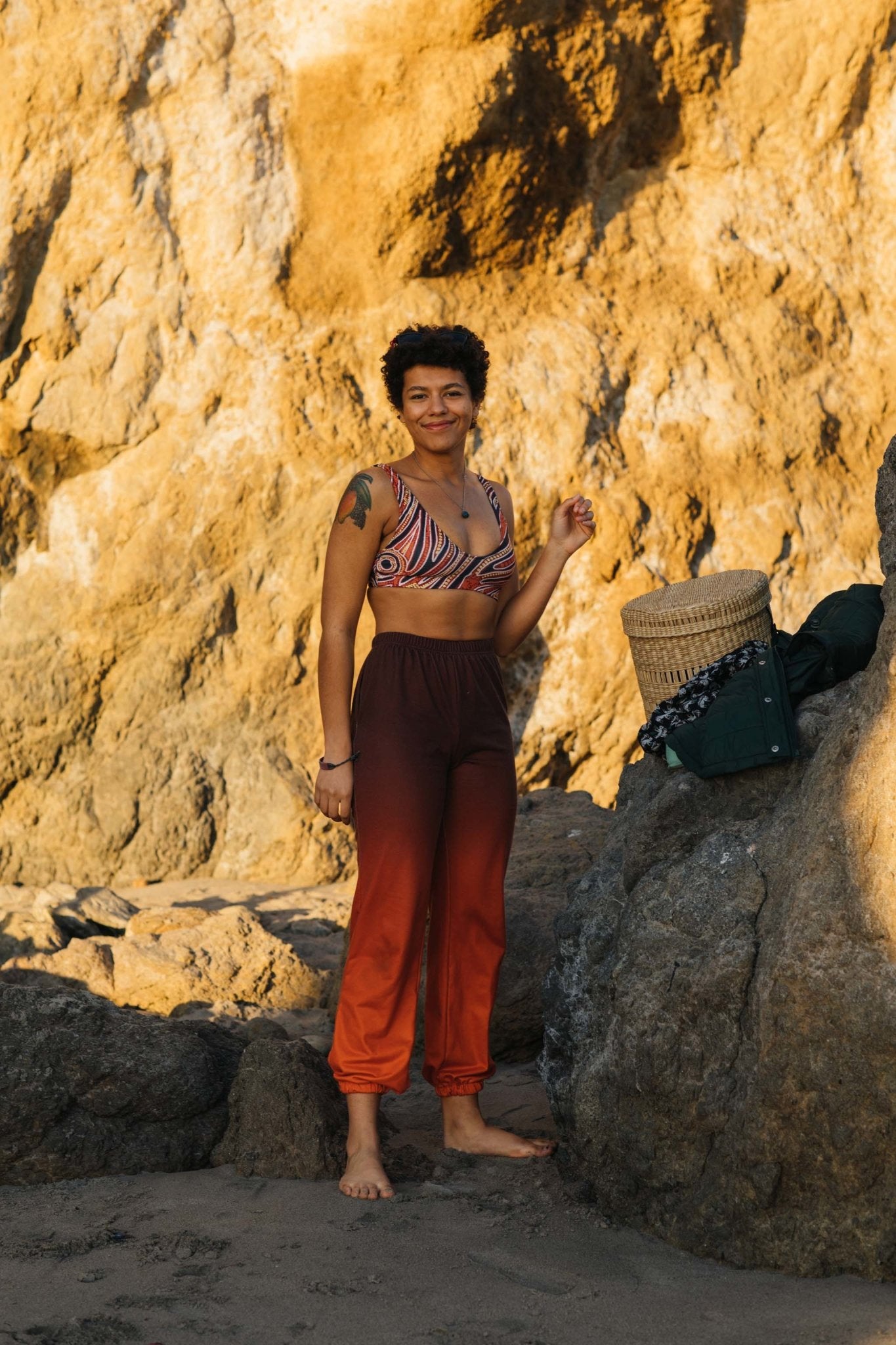 Red earth by Francine Kulitja Padded Sustainable Top - PaletTheory