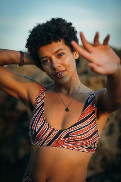 Red earth by Francine Kulitja Padded Sustainable Top - PaletTheory