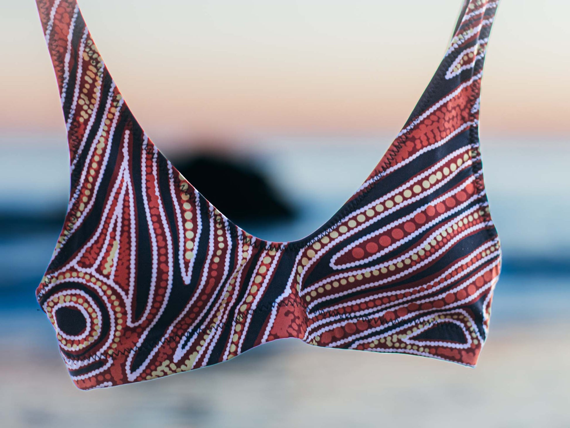 Red earth by Francine Kulitja Padded Sustainable Top - PaletTheory